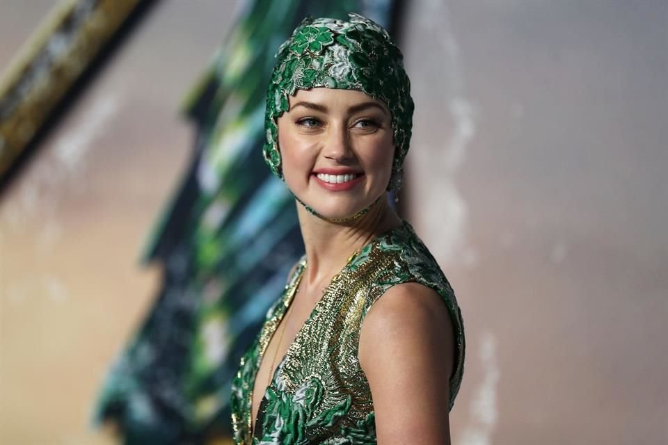 La actriz, quien interpreta a Mera en 'Aquaman', aseguró que tiene una buena amistad con su ex novio.