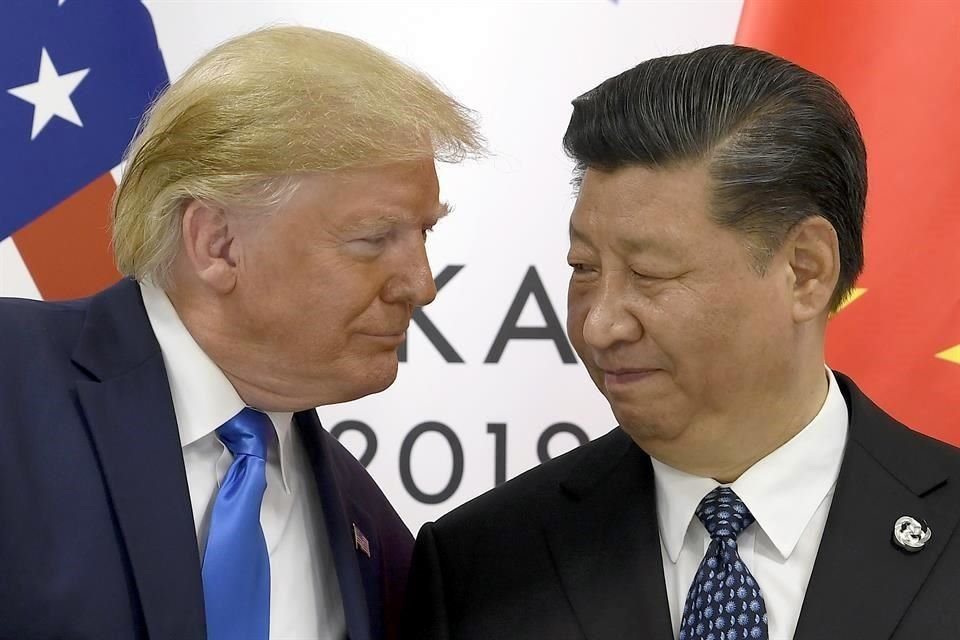 El Presidente Donald Trump, junto a su homólogo chino Xi Jinping.