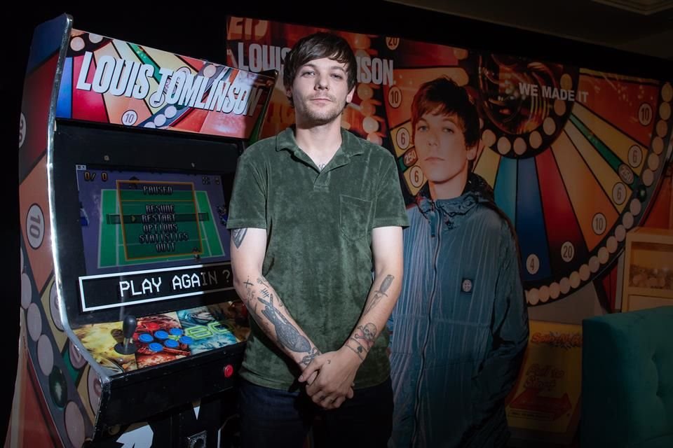 Tomlinson lanzará en enero su disco como solista, 'Walls'.