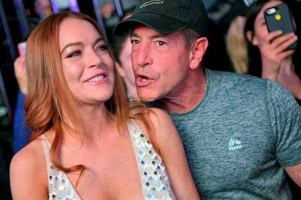 Michael Lohan fue detenido en la calle frente a sus hijos y fue llevado a la cárcel en Southampton después de que su esposa presentara una denuncia.