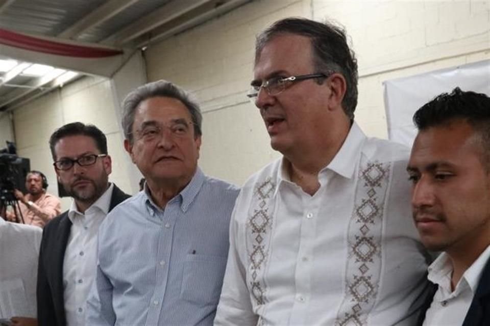 Pío López Obrador y Marcelo Ebrard.