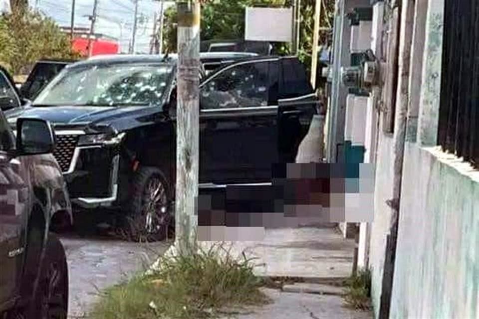 En el enfrentamiento con marinos participaron pistoleros que se desplazaban en una camioneta Cadillac Escalade.