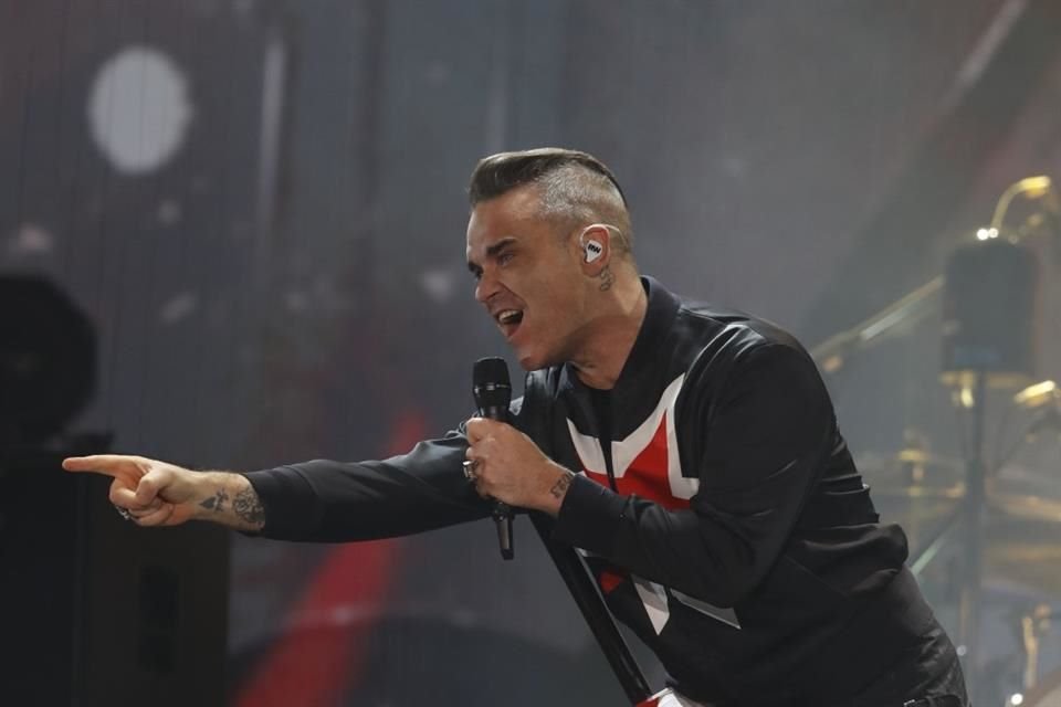El cantante Robbie Williams ofrece sus servicios como manifestante famoso en Suiza.