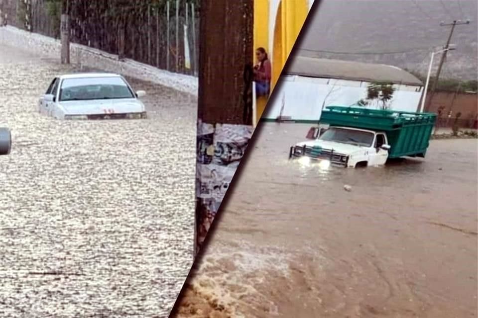 Vehículos atrapados en el agua por las fuertes lluvias en el Municipio de Tlapa.