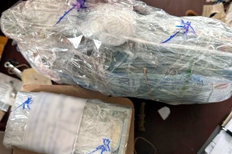 En el lugar fueron encontrados 12 millones 669 mil 687 pesos y 11 mil 33 dólares en efectivo.