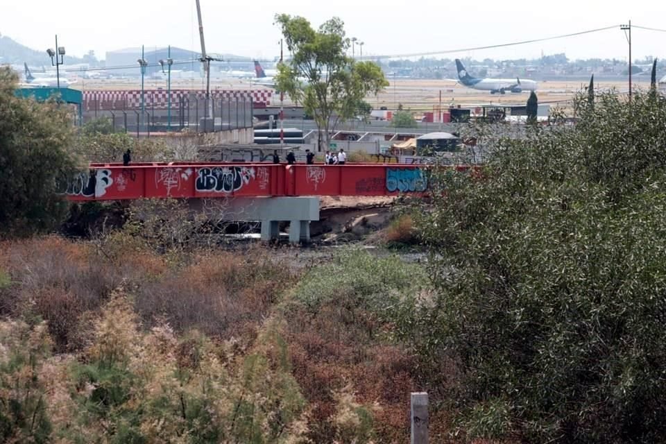 Hallan A Persona Muerta En Canal De Aguas Negras