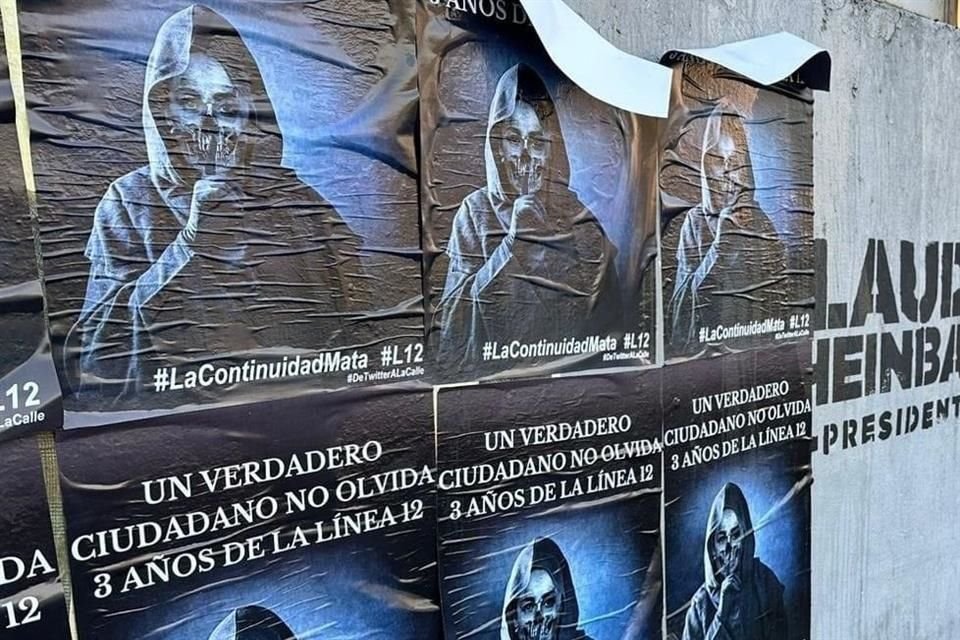 En paredes fueron pegados carteles que asemejan la Santa Muerte con el rostro de Sheinbaum.