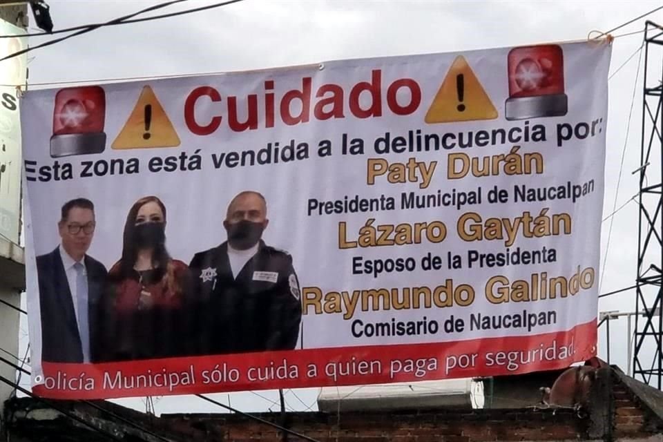 'Cuidado, esta zona está vendida a la delincuencia por Paty Durán, Presidenta Municipal de Naucalpan', refiere uno de los carteles de vecinos inconformes.