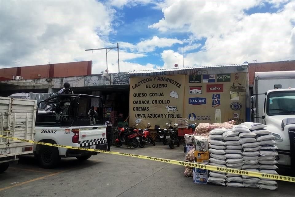 El cuerpo del comerciante quedó dentro de una cremería, en la nave 2 del mercado.