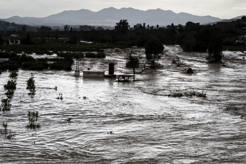 Un río crecido tras inundaciones provocadas por lluvias en Malaga, España, el 29 de octubre.