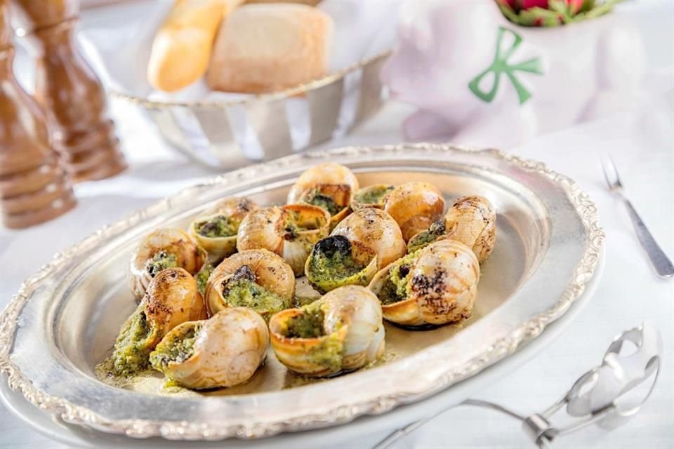 No te puedes ir sin probar los escargots de bourgogne.