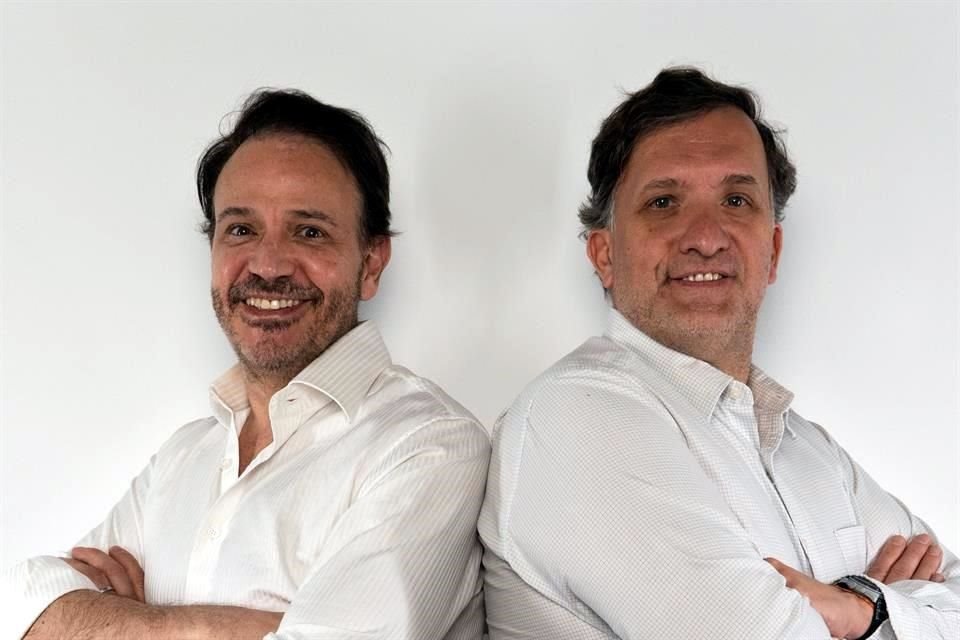 Eric Descombes y Manuel González.