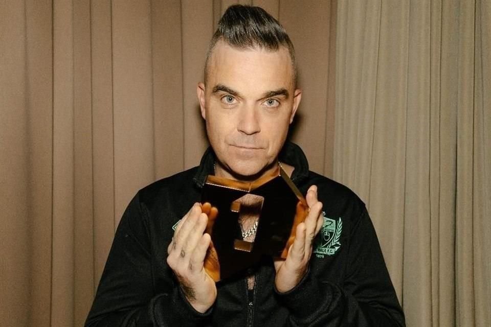 Robbie Williams se reunió con su ex compañero de Take That, Gary Barlow, para coescribir una rola sobre un acosador ficticio de Morrissey.