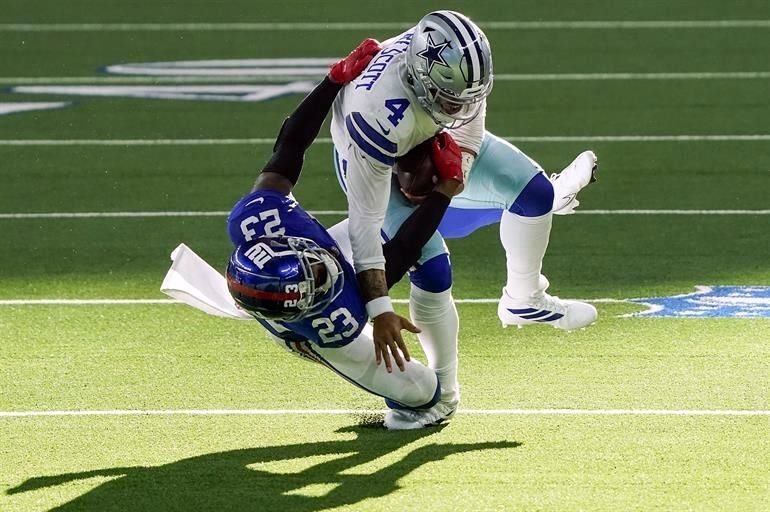 Dak Prescott sufrió una fractura de tobillo, el QB suplente Andy Dalton encabezó una serie que acabó en gol de campo en la última jugada y Vaqueros (2-3) vencieron 37-34 a Gigantes (0-5).