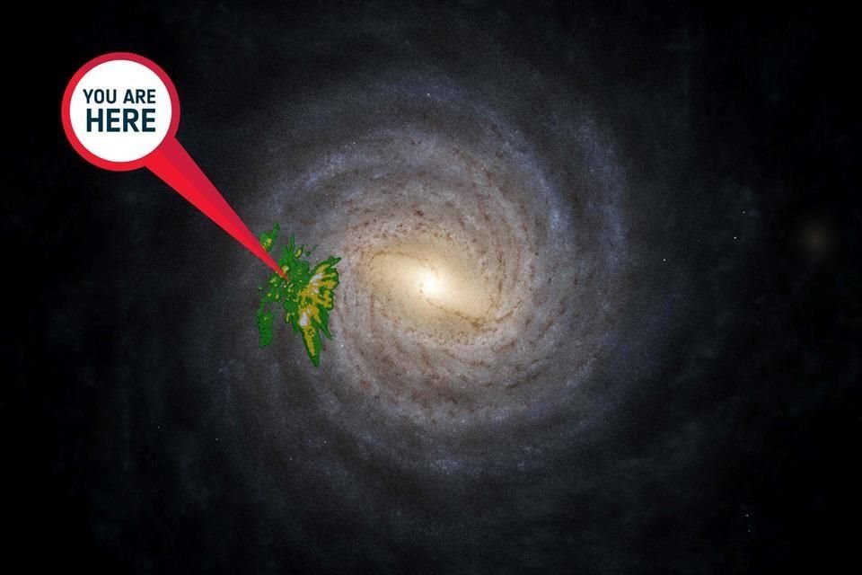 Interpretación artística de la Vía Láctea elaborada por la Agencia Espacial Europea; el mensaje 'usted está aquí' apunta hacia el Sol.