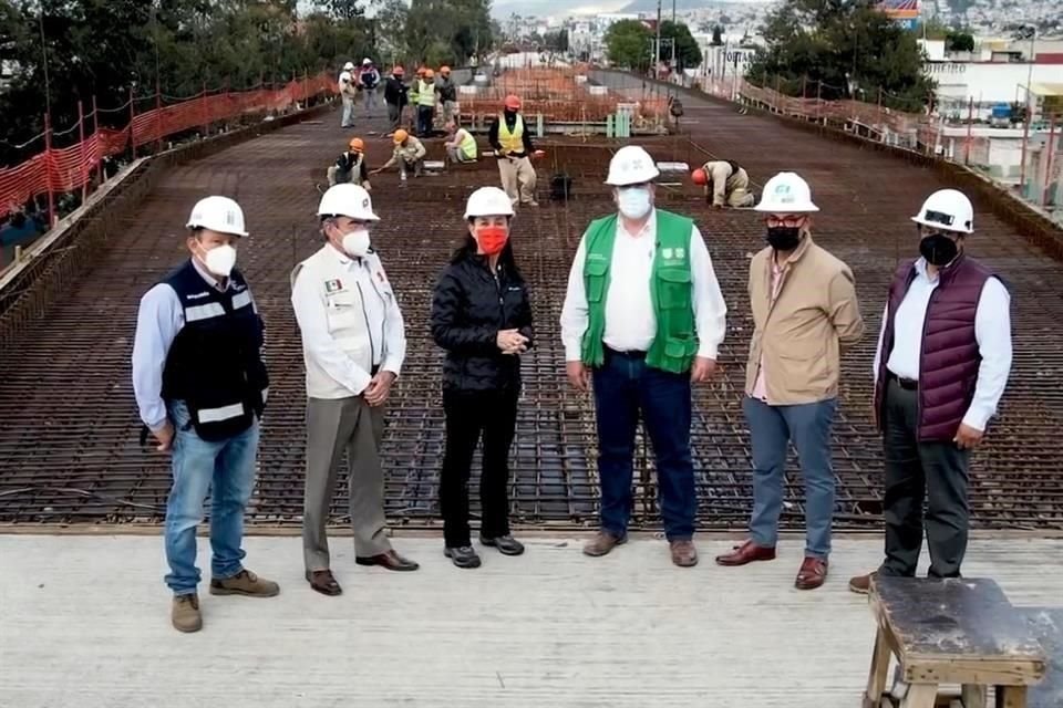 'Como nos comprometimos aqu con las empresas en noviembre va a estar listo y operando el Trolebs Elevado de la Ciudad de Mxico sobre el Eje 8 de Ermita Iztapalapa', dijo Sheinbaum.